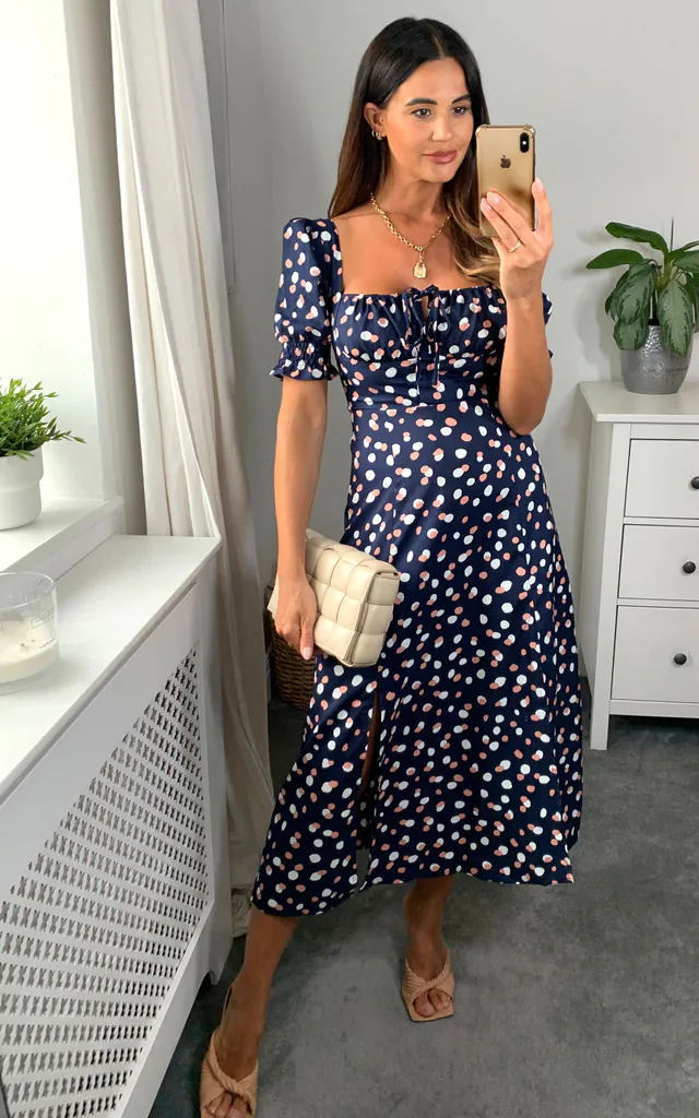 Bardot midi dress with front tie bow fastening in navy polka dot print | D.Anna | SilkFred Bardot midi dress with front tie bow fastening in navy polka dot print | D.Anna | SilkFred