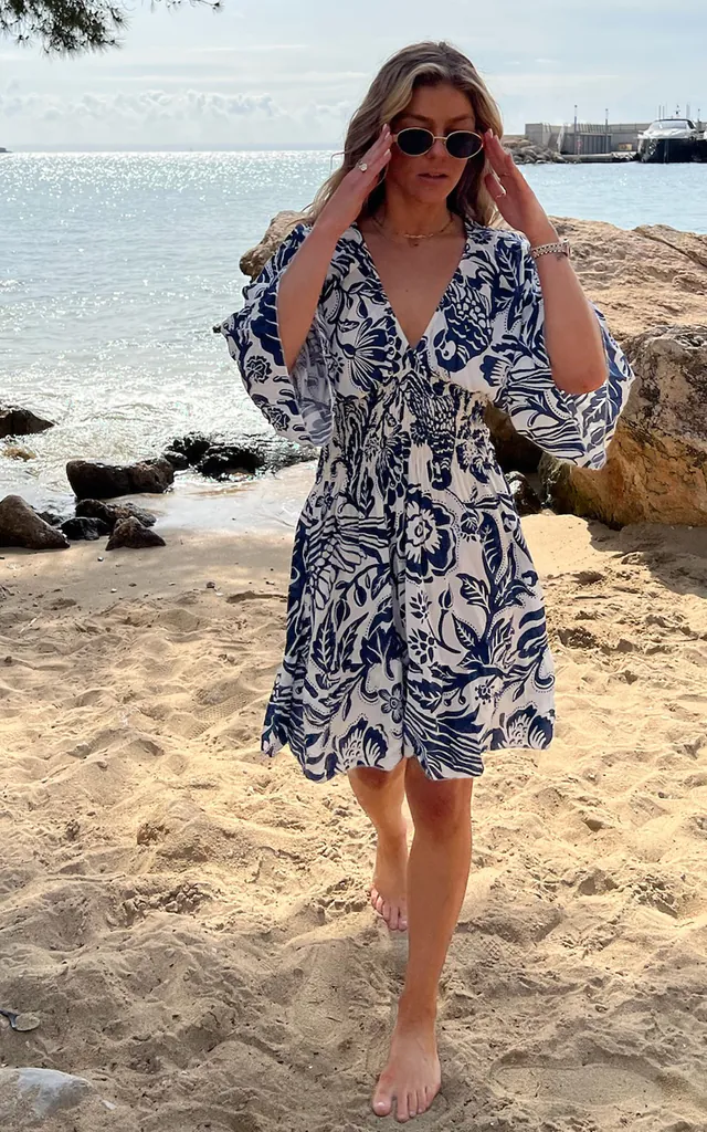 Oversized V Neck Detailed Floral Print Mini Dress in Navy and White | HOXTON GAL | SilkFred Oversized V Neck Detailed Floral Print Mini Dress in Navy and White | HOXTON GAL | SilkFred