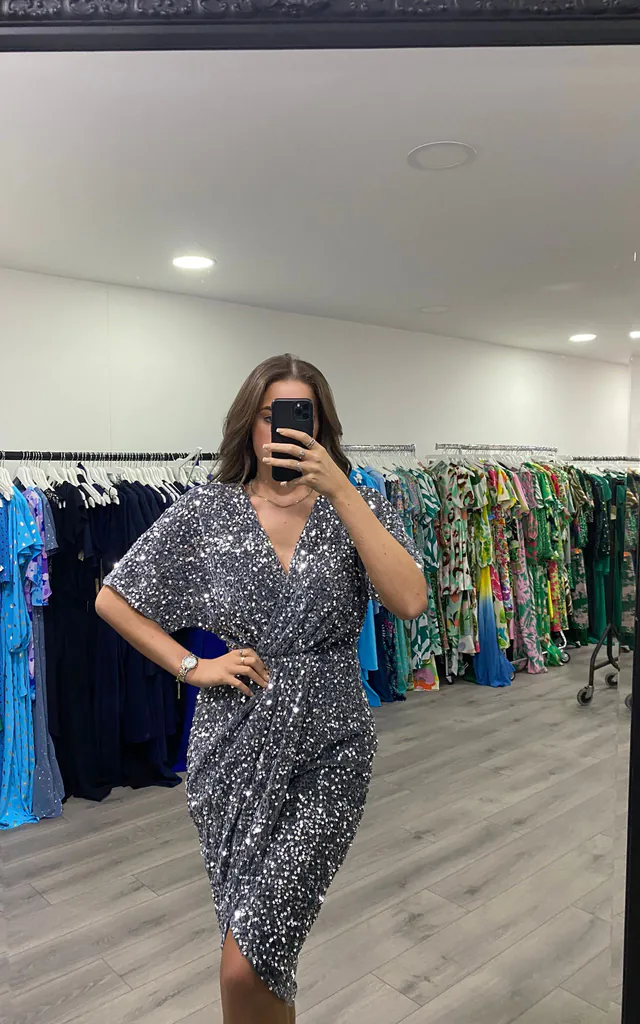 novah sequin dress Sparkling Glam Introducing our NEW Novah Sequin Midi Dress..79 This stunning midi piece features a wrap-style silhouette, relaxed sleeves, and stand-out sequin detailing x #rubyrouge #boutique